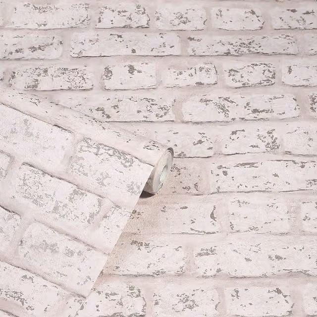 Arthouse Rustic Distressed Brick Wall Effect Metallic Wallpaper in Blush Pink and Grey