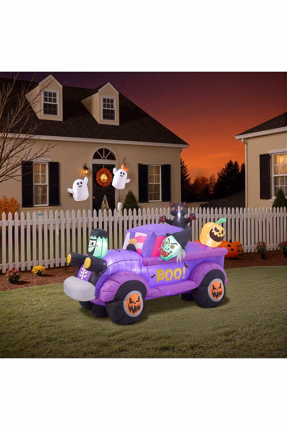Garden Sanctuary 5ft Halloween Inflatable Witch Car with Jack-o'-lantern LEDs in Purple, Height: 152.4 cm – 2