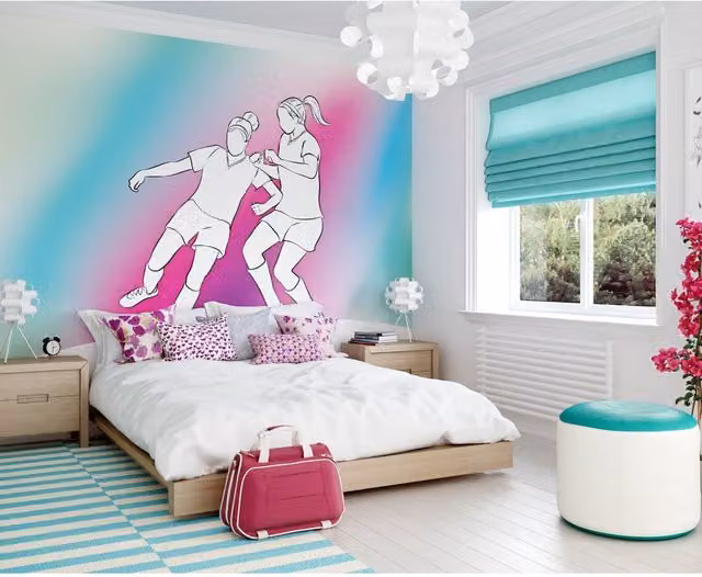 Origin Murals Girls Playing Football Wall Mural in Blue and Multicolour