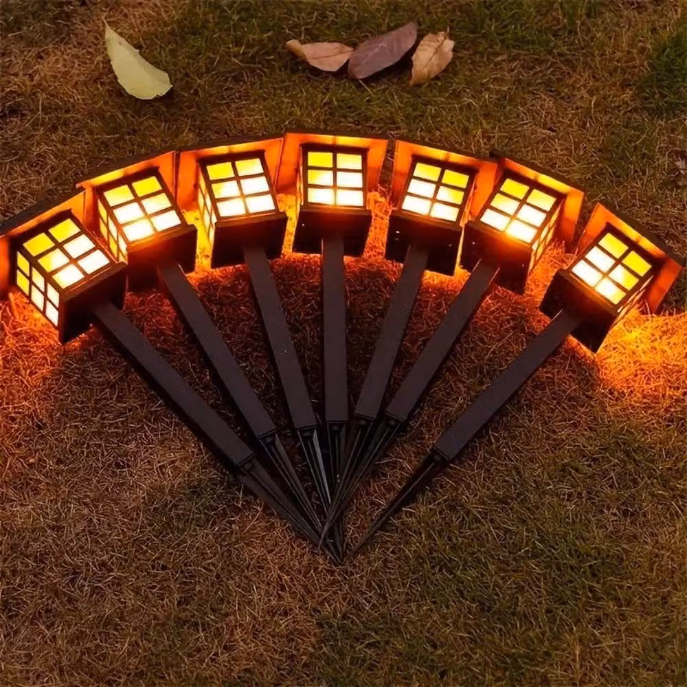 NESTLUNE Solar LED Flickering Flame Torch Stake Lights, Black – 4