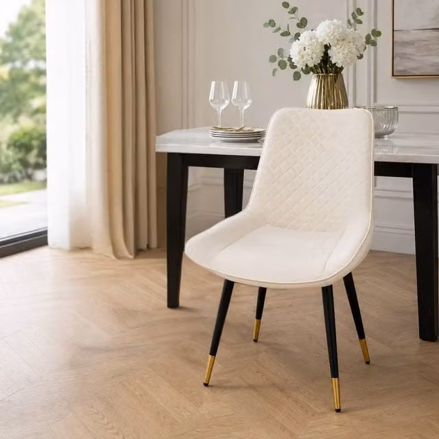 Stratus Interiors Luna Quilted Velvet Dining Chair in Cream with Black Metal Legs