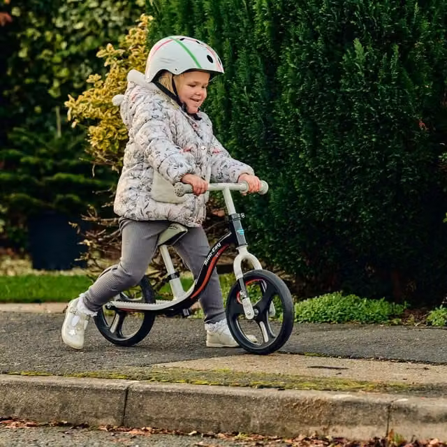 Ride-ezy Black and Silver Motorised Balance Bike with Height Adjustment and Light and Sound Features
