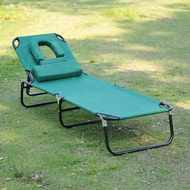Outsunny Folding Sun Lounger with Pillow and Reading Hole, Dark Green