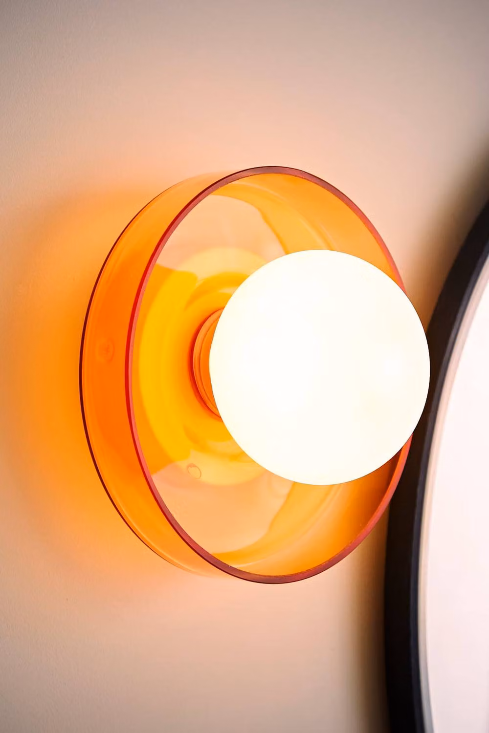 ValueLights Newbury Pair of Amber Glass Globe Bathroom Wall Lights with Bulbs in Gold/Brass Finish – 2