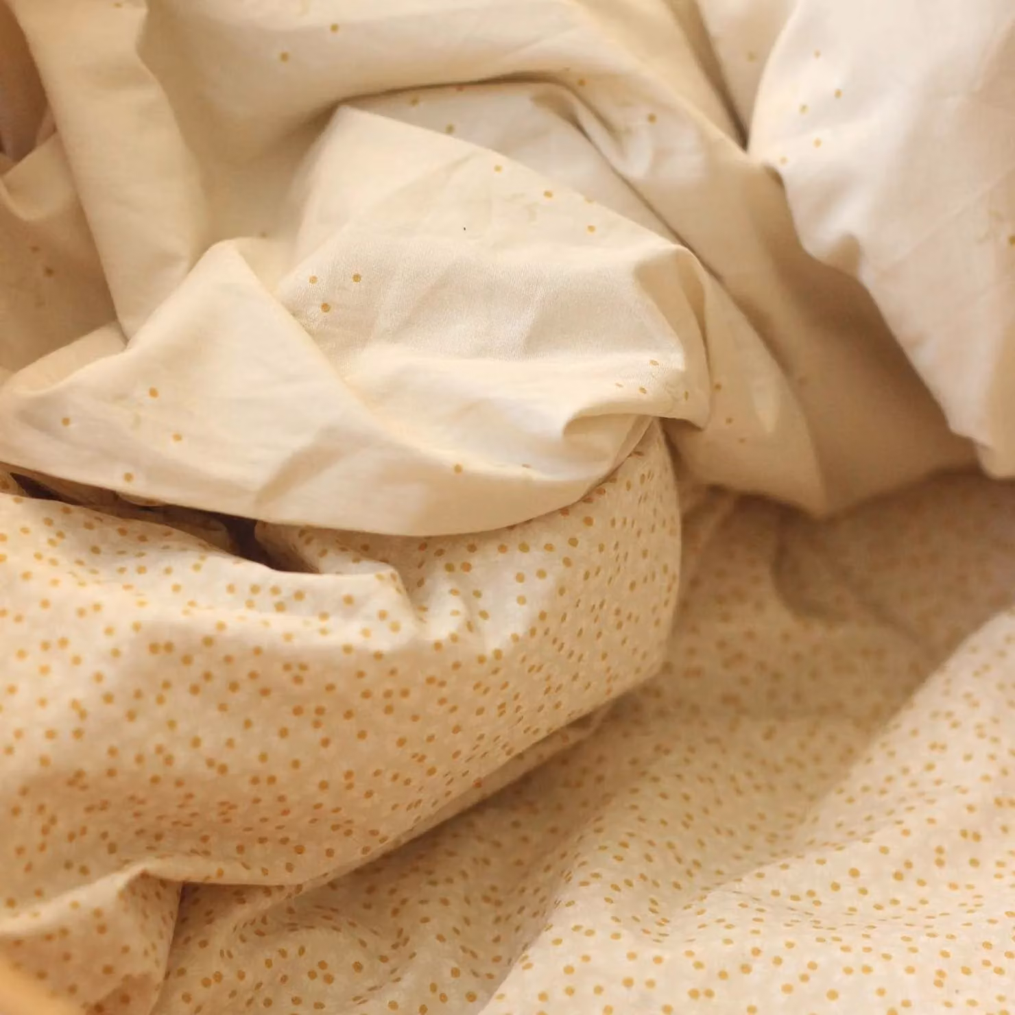 Avery Row Organic Cotton Cotbed Bedding Set in Wild Chamomile Yellow – 3