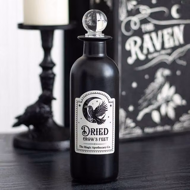 Uniqueful Black Decorative Glass Potion Bottle with Dried Crow's Feet for Halloween Tabletop Decor – 1