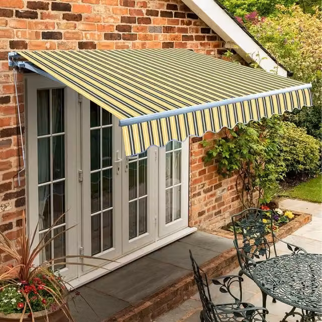 Primrose Manual Retractable Wall-Mounted Awning with Folding Arms in Yellow and Grey, W: 300 cm, D: 250 cm