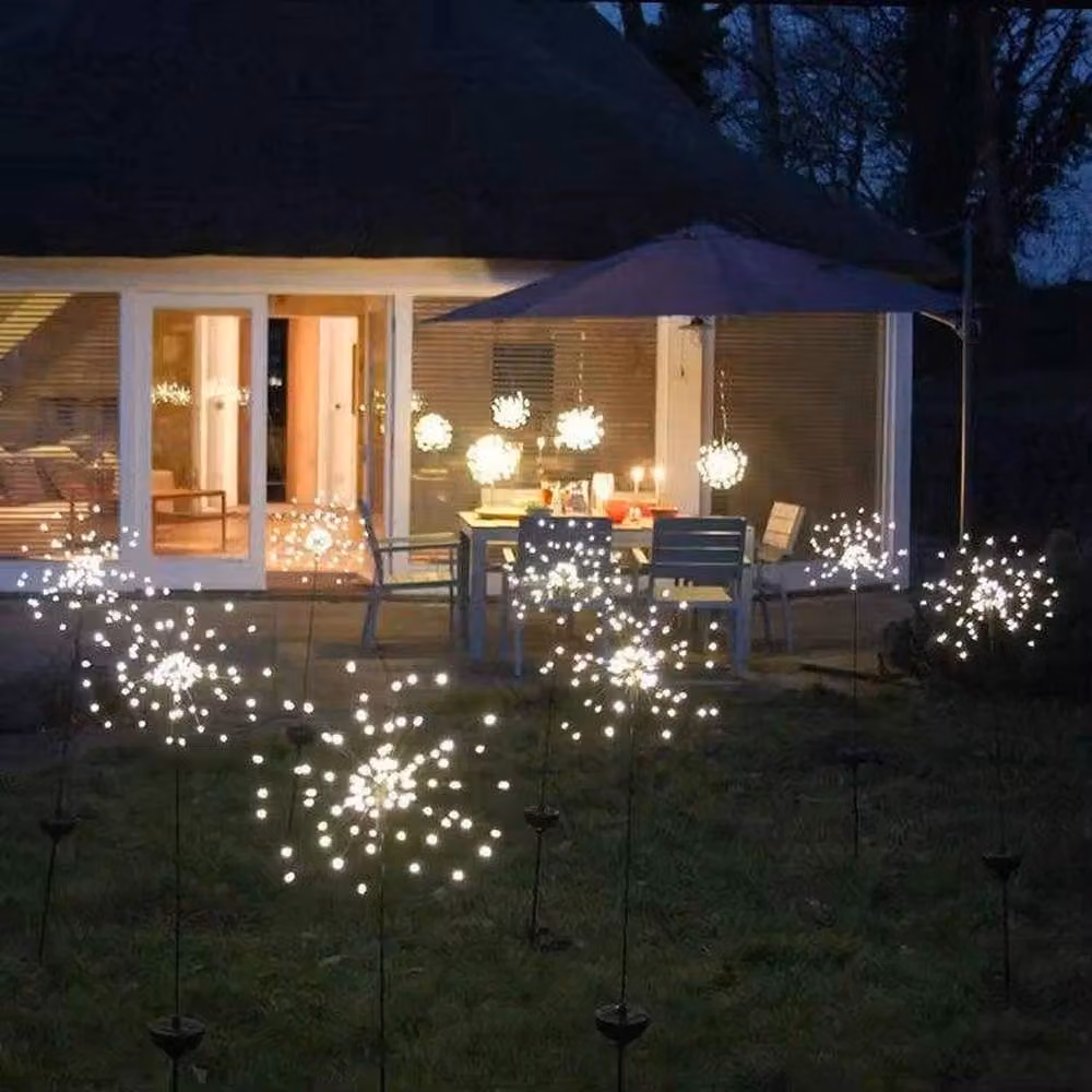 FLAVORA 4-Piece Set of Black Solar Powered LED Outdoor Firework Effect Garden Lights with Warm White Star Effect – 2