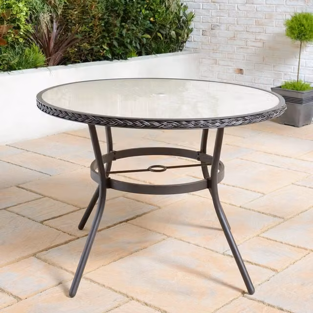 Outdoor Essentials Padstow Round Outdoor Table in Brown with Metal and Glass Construction