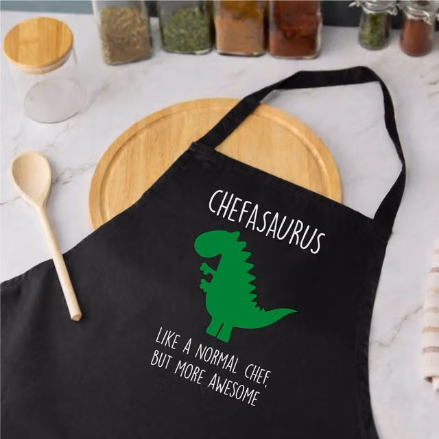 60 Second Makeover Chefasaurus Chef Dinosaur Apron in Black