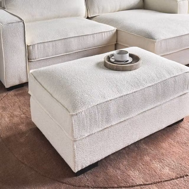 Wyld and Coco Beige Bouclé Upholstered Rectangular Ottoman W/D/H: 65 x 45 x 33 cm