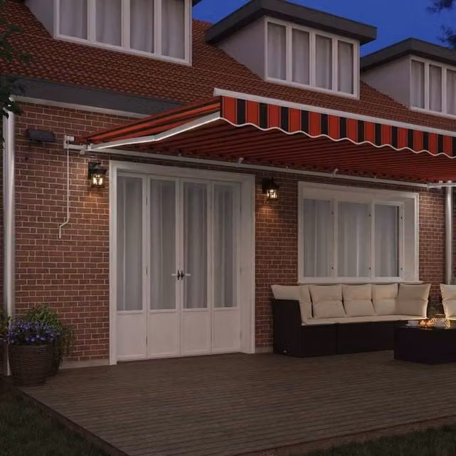 Berkfield Home Manual Retractable Folding Arm Awning with LED in Orange and Brown Striped Polyester, W: 600 cm, D: 300 cm