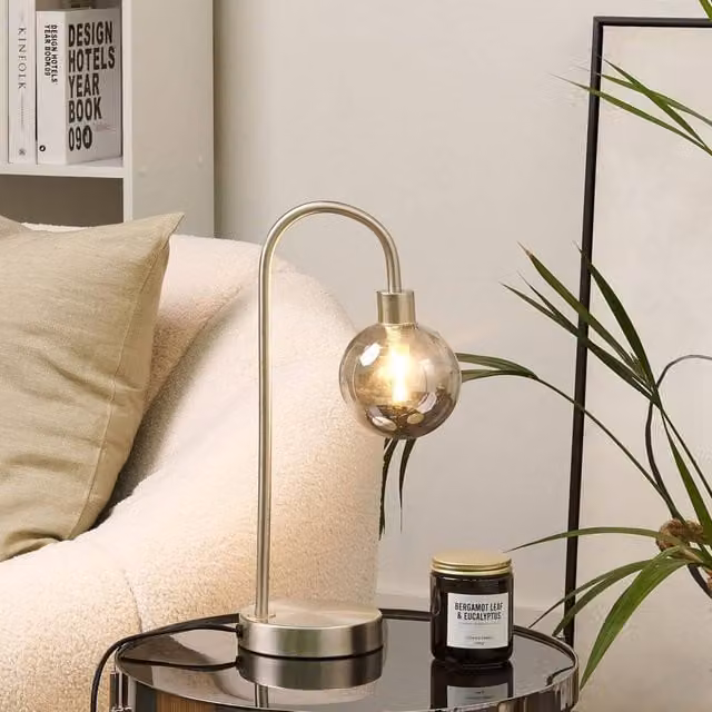 Wyld and Coco Modern Glam Table Lamp in Silver with Round Transparent Glass Shade – 1