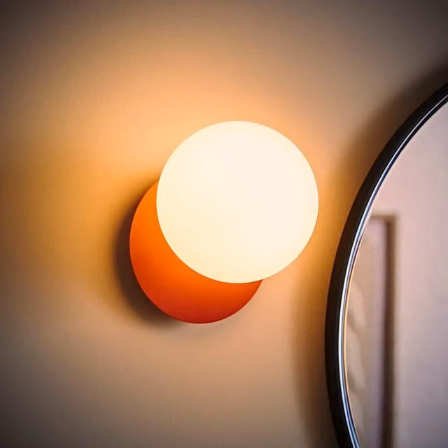ValueLights Darla Frosted Globe Bathroom Wall Light in Rust Orange