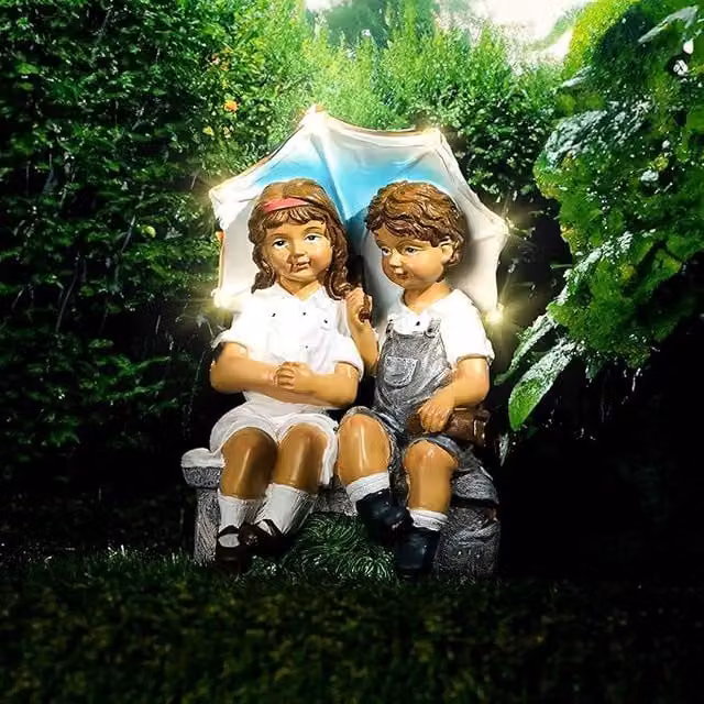 Marco Paul Solar Light Umbrella Boy and Girl Multicolour Tabletop Garden Ornament with Dusk Sensor – 1
