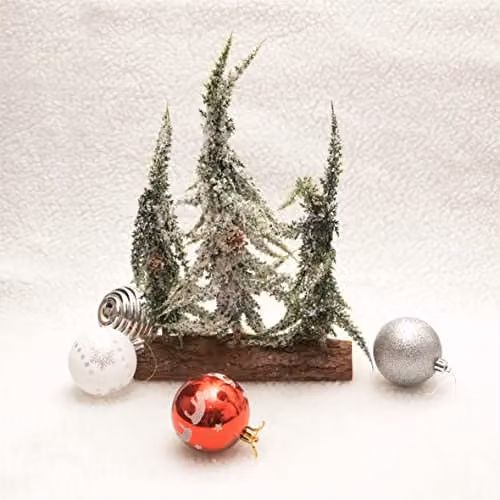 Netagon Decorative Green Snow Topped Mini Christmas Tree Display on Rustic Wood Log