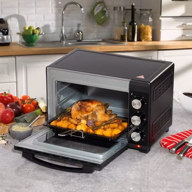 Daewoo 23L Electric Mini Oven in Black with 1300W Power, Adjustable Temperature Control, and Timer for Baking, Grilling and Toasting – 1