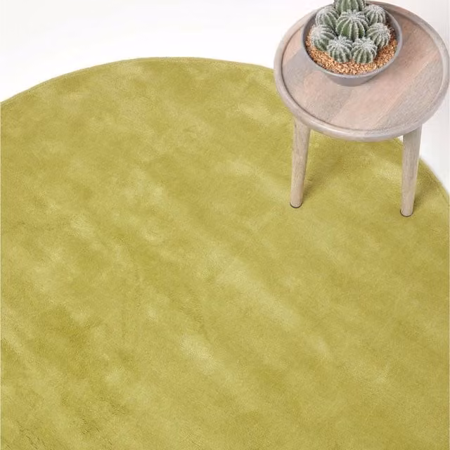 Homescapes Hand Tufted Plain Round Cotton Rug in Green