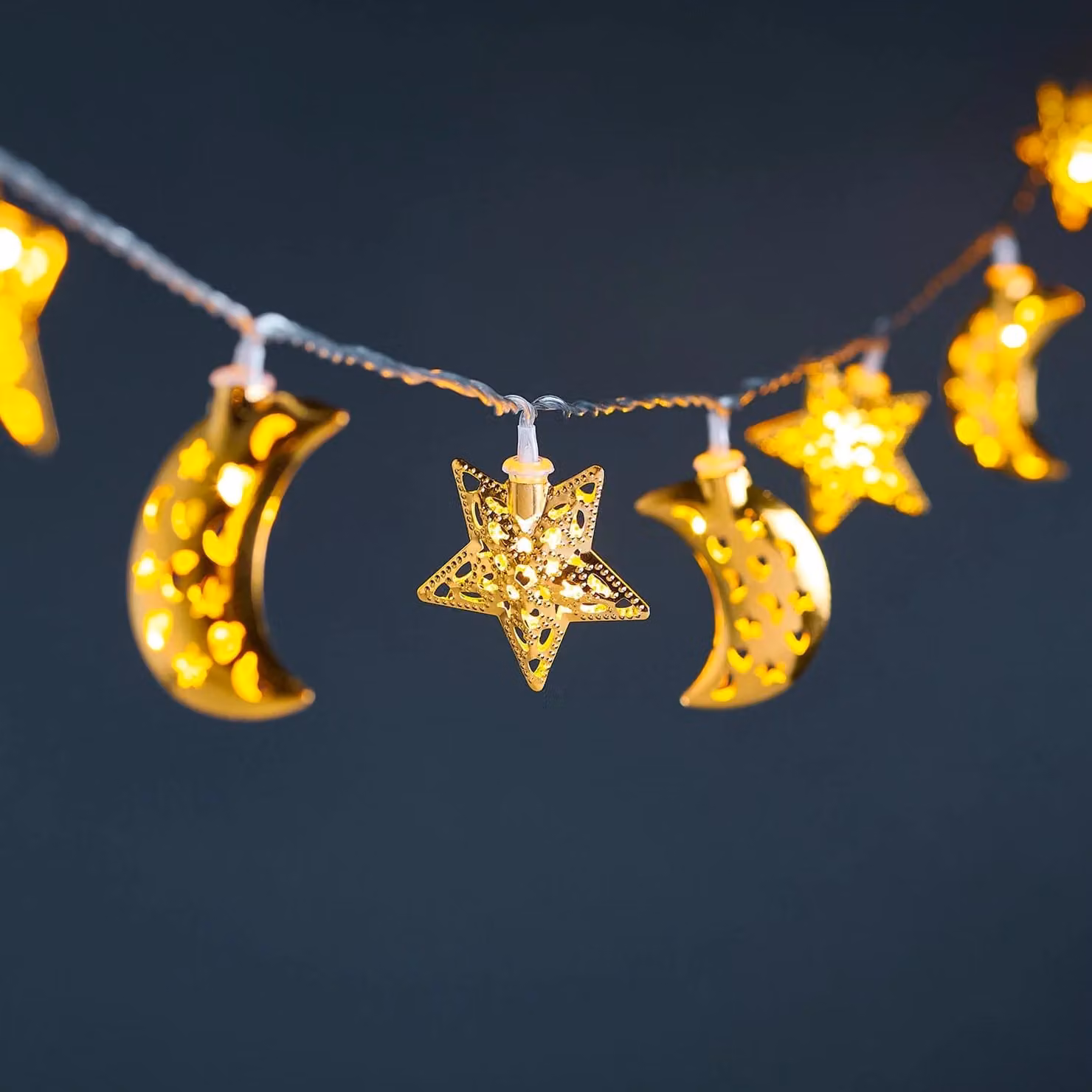 Lights4fun 16 Filigree Moon and Star LED Fairy Lights in Gold/Brass with Warm White Light