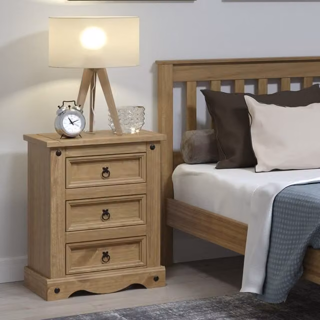 Core Products Ltd Corona Three Drawer Bedside Cabinet in Antique Waxed Pine