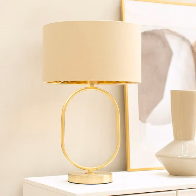 Antonia Oval Table Lamp with Brushed Gold Metal Base and Beige Fabric Shade