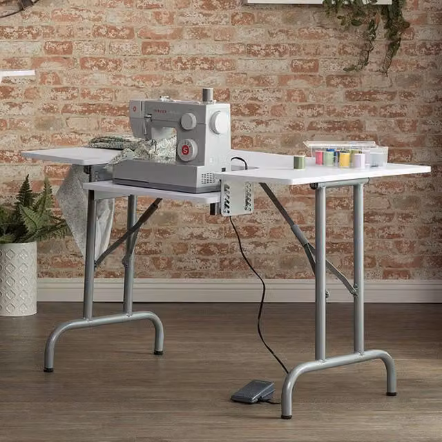 Studio Designs Folding Sewing Table in White and Silver with Height Adjustable Drop Leaf Top
