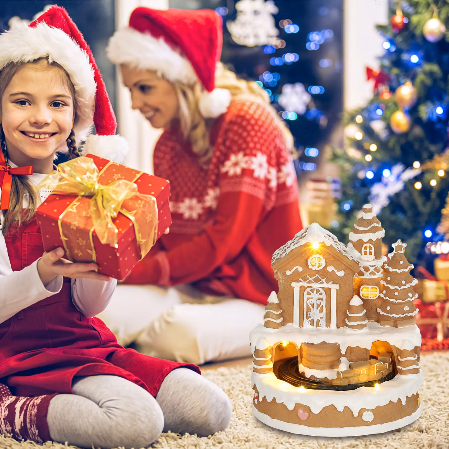 HOMCOM Christmas Gingerbread House Lighted Musical Snow Village with Rotating Train and LEDs in White and Brown – 7
