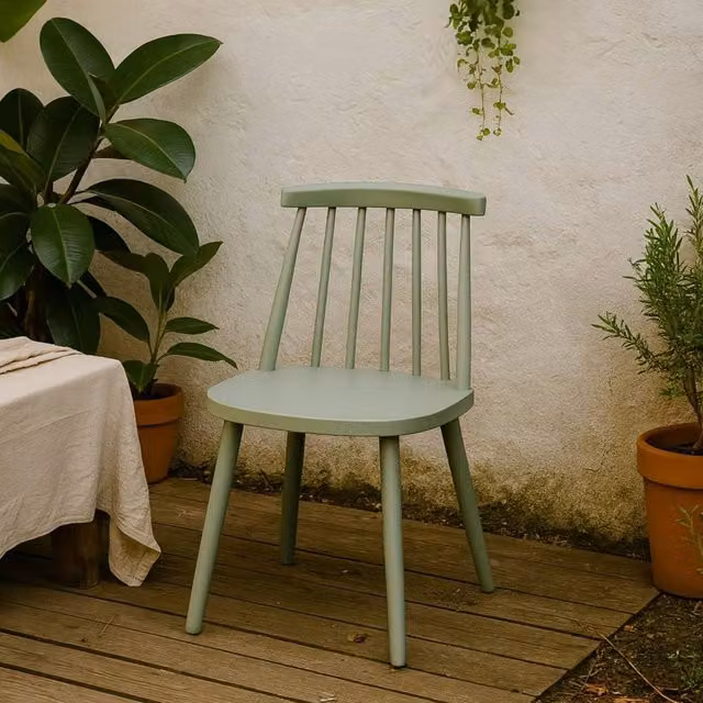 Wyld Haus Bruniquel Scandinavian Plastic Dining Chair with Spindle Backrest in Sage Green – 1