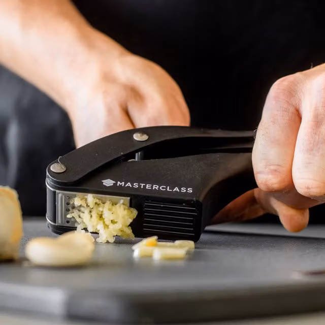 MasterClass Stainless Steel Garlic Press Slicer with Ergonomic Grip, Black