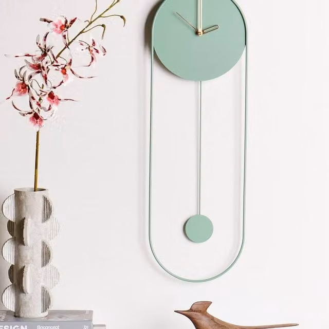 Wyld and Coco Modern Oval Pendulum Wall Clock in Green and Gold Metal, W/H: 20 x 62 cm