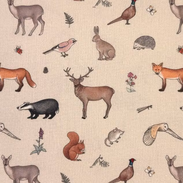 Emma Lawrence Forest Friends Childrens Linen Fabric in Beige and Multicolour