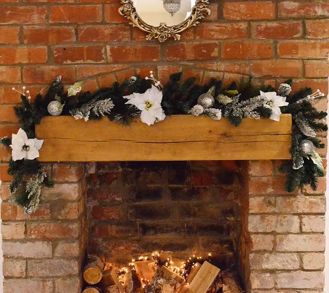 Premier White Poinsettia Christmas Garland with Silver Baubles and Glitter Snow Flocking