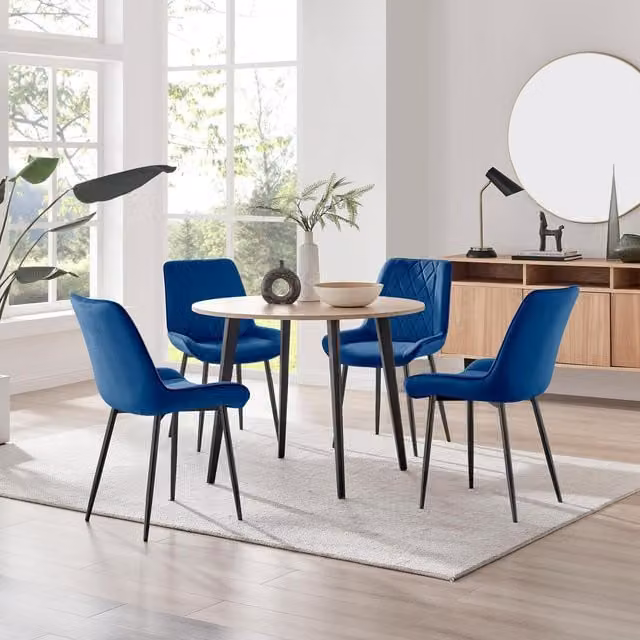 FurnitureboxUK Koko Oak Effect Round Dining Table and 4 Pesaro Navy Blue Dining Chairs with Black Legs