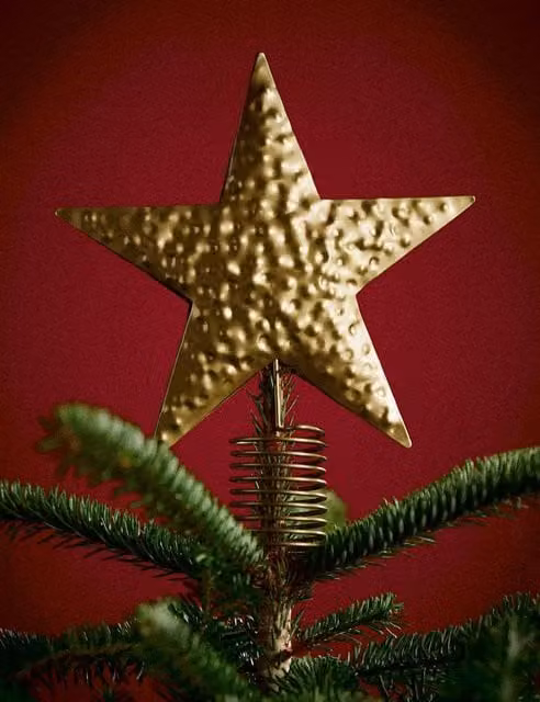 M&S Gold Metal Star Christmas Tree Topper in Antique Brass