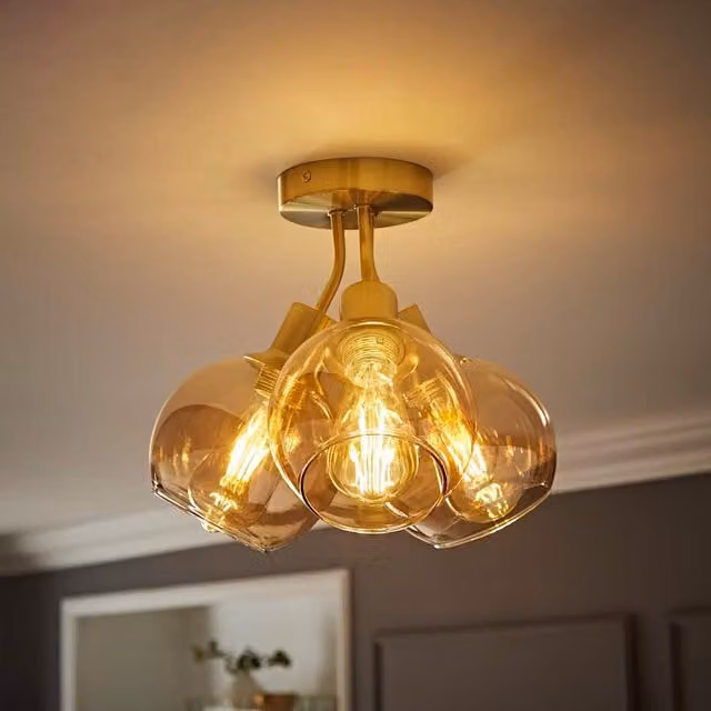 ValueLights Bellamy 3 Way Bubble Cluster Flush Ceiling Light in Gold/Brass with Amber Glass Spheres