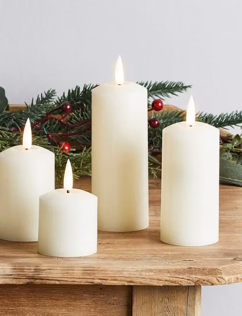 Lights4fun Set of 4 White Wax Pillar LED Tabletop Candles with Timer