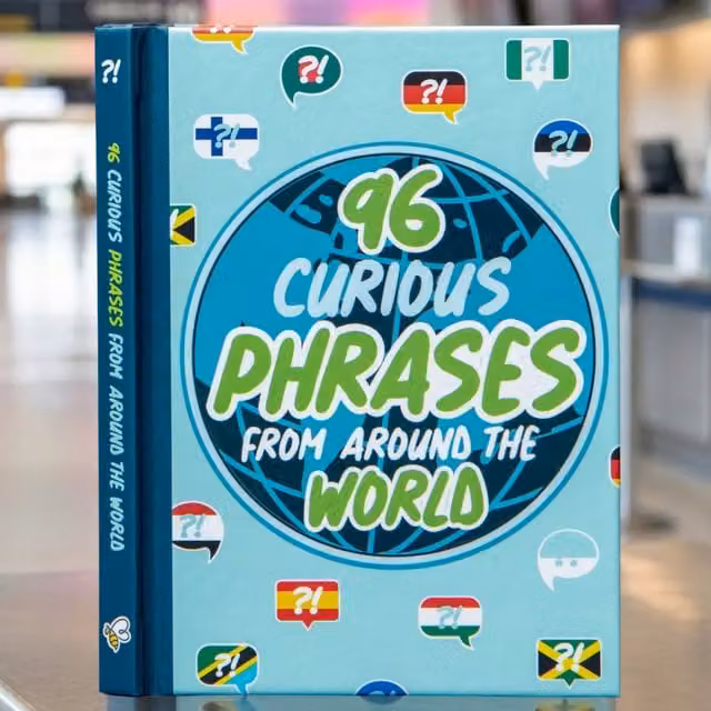 96 Curious Phrases From Around The World Book by Boxer Gifts in White and Multicolour