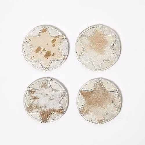 Homescapes Set of 4 Round Leather Coasters in Brown and Beige with Geometric Star Pattern, Diameter: 10 cm