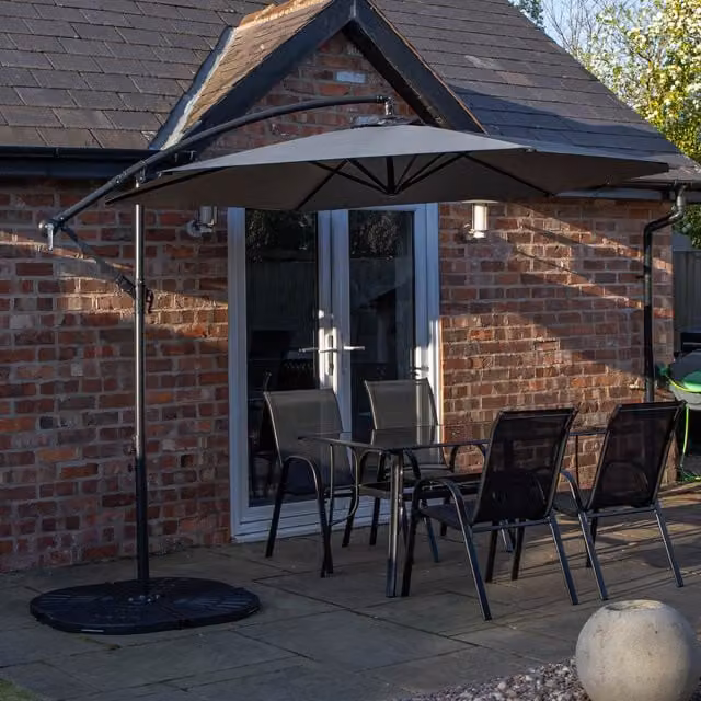 Samuel Alexander Modern 4 Person Rectangular Glass Top Dining Set with Grey Parasol and Black Base