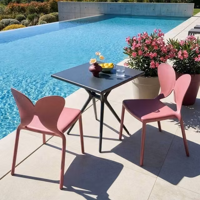 Wyld Haus Set of 2 Pink Matt Plastic Modern Garden Chairs – 1