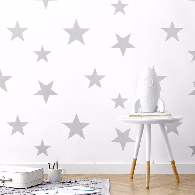 Hibou Design Stars Geometric Non-Woven Wallpaper in Silver and White