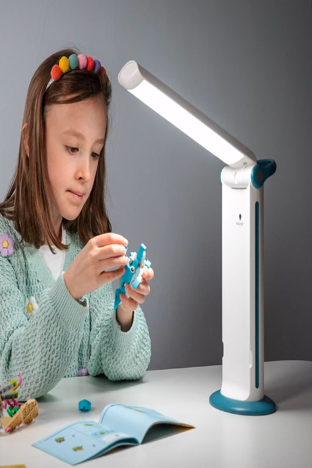 Daylight Twist 2 Go Compact Rechargeable LED Desk Lamp in Petrol, White or Multicolour – 8