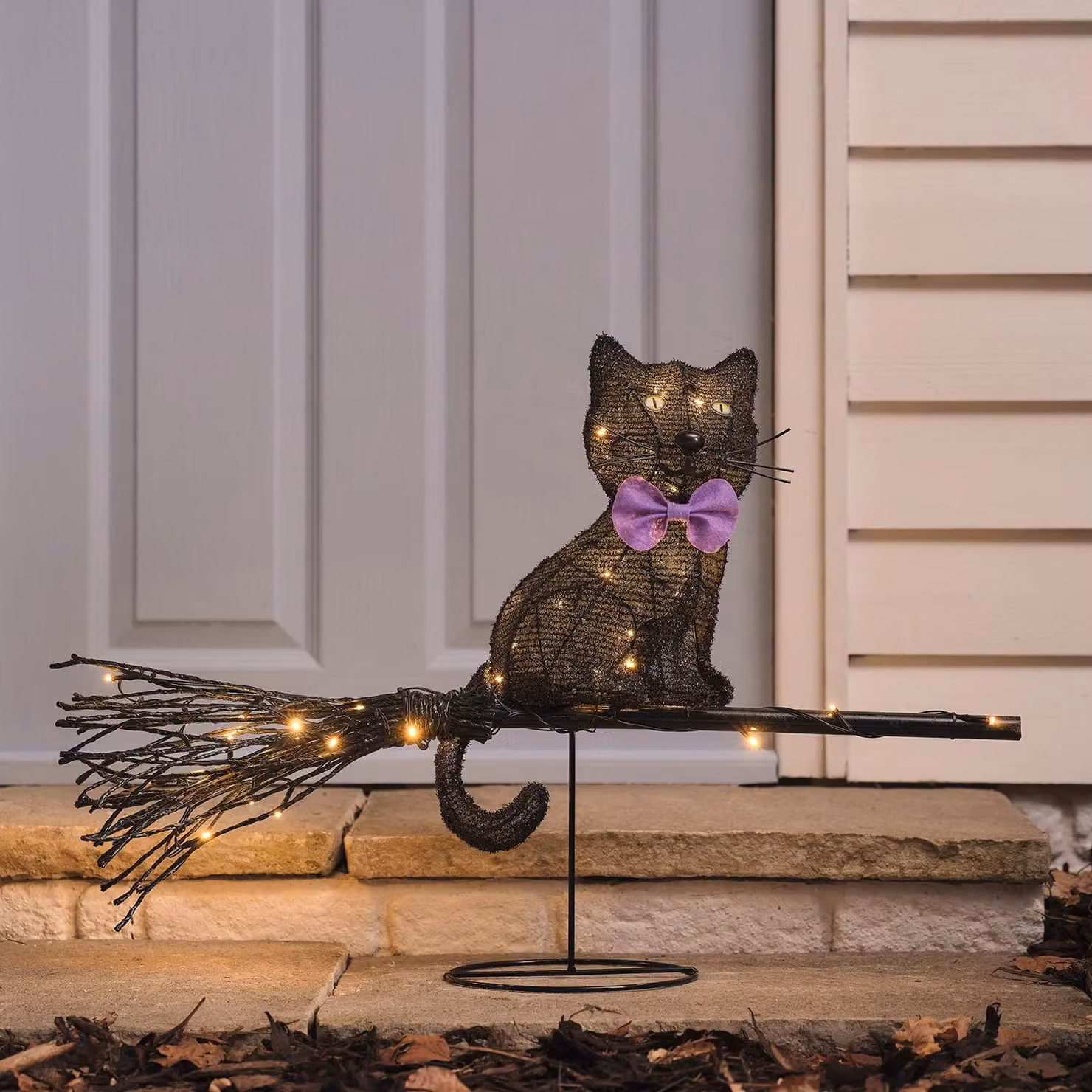 Lights4fun Cat on a Broom Outdoor LED Halloween Decoration in Yellow, Purple, Black and White – 1