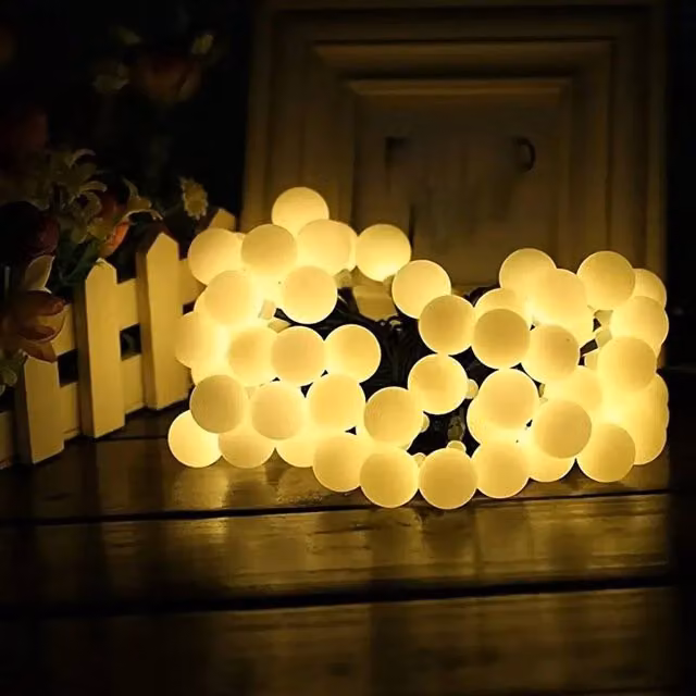 NESTLUNE Solar LED Ball String Lights in Warm White with Remote Control and Timer, 12m Outdoor Party Fairy Lights – 1