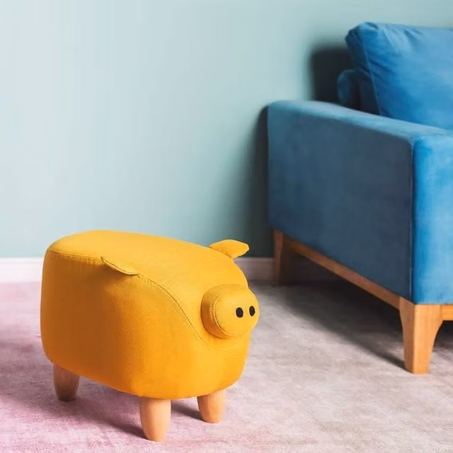 Wyld and Coco Pig-Shaped Kids Stool in Yellow Fabric with Solid Rubberwood Legs – 1