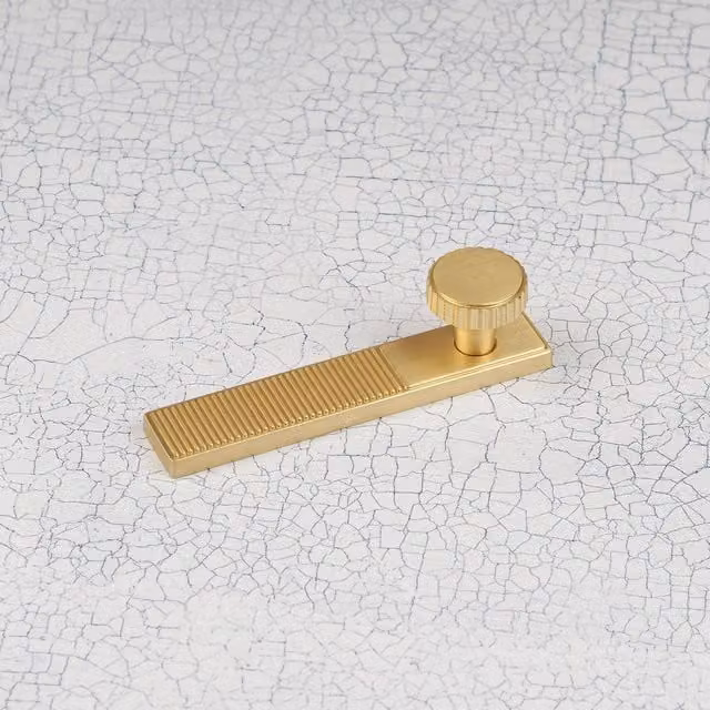 Handle & Home Ribbed Detailing Handles and Coordinating Knobs in Brushed Brass Gold, Zinc