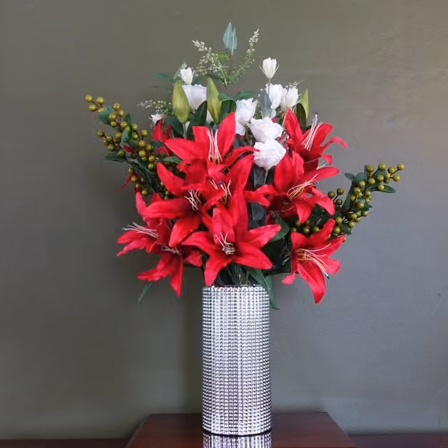 Artificial Red Lily Arrangement with Green Leaves in a Silver Glass Vase
