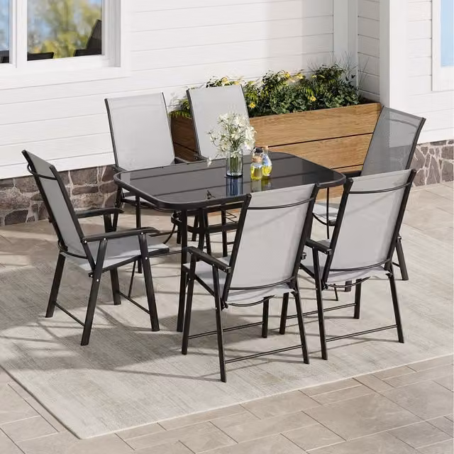 Komore Black Rectangular Tempered Glass Patio Table with 6 Foldable Chairs