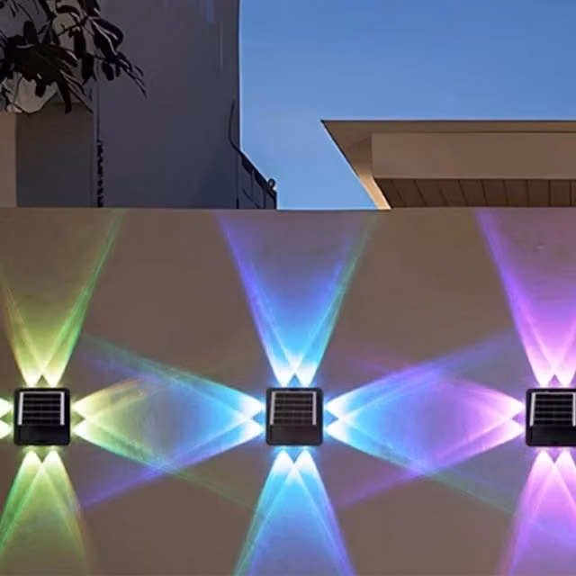 ExtraStar 4-Way RGB LED Solar Wall Light in Black and White for Garden Use