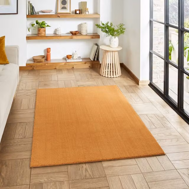 Terrys Bay Washable Rectangular Living Room Rug in Beige and Orange